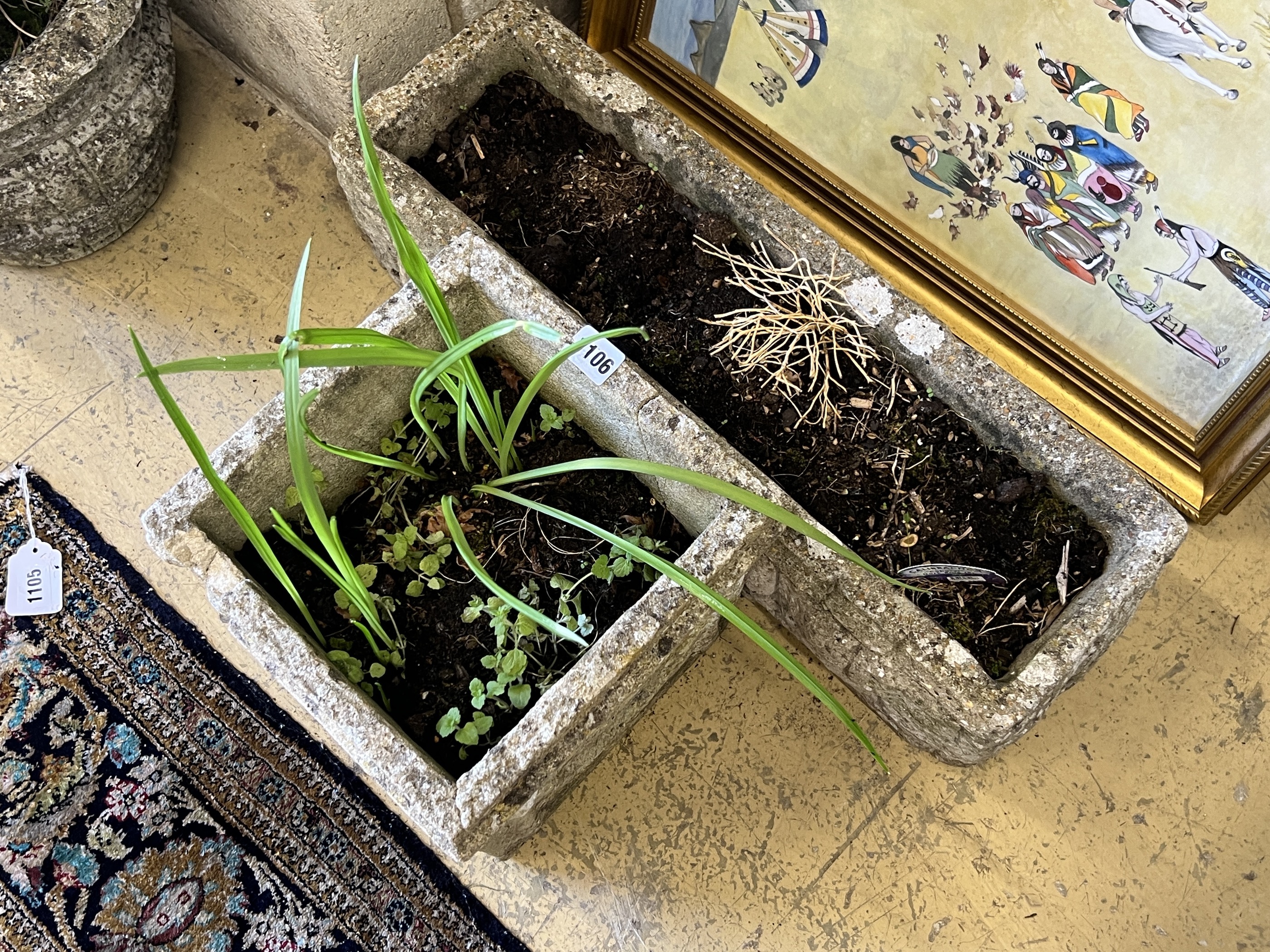 Two reconstituted stone garden planters, larger width 57cm